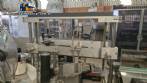 Etiquetadora autom�tica de doble cabezal para botellas planas Bauch Campos