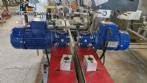Etiquetadora automtica de doble cabezal para botellas planas Bauch Campos