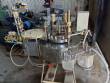 M�quina de llenado de frascos y matraces con tap�n de