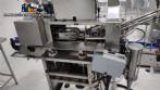 Lnea para llenado de salmuera, insercin manual de producto y taponado automtico