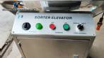 Elevador de clasificaci�n de c�psulas de acero inoxidable Elevador clasificador ACG Pam