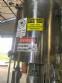 Llenadora rotativa gravimtrica de acero inoxidable con cabina
