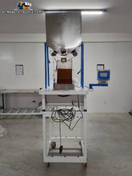 M�quina JHM Maximatic para dosificaci�n, pesaje, llenado y envasado de polvo de 150 a 1000 gramos.