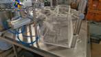 M�quina rotativa de acero inoxidable para llenado, dosificaci�n y sellado, con junta de aluminio, para tarros, vasos y botellas Delgo.